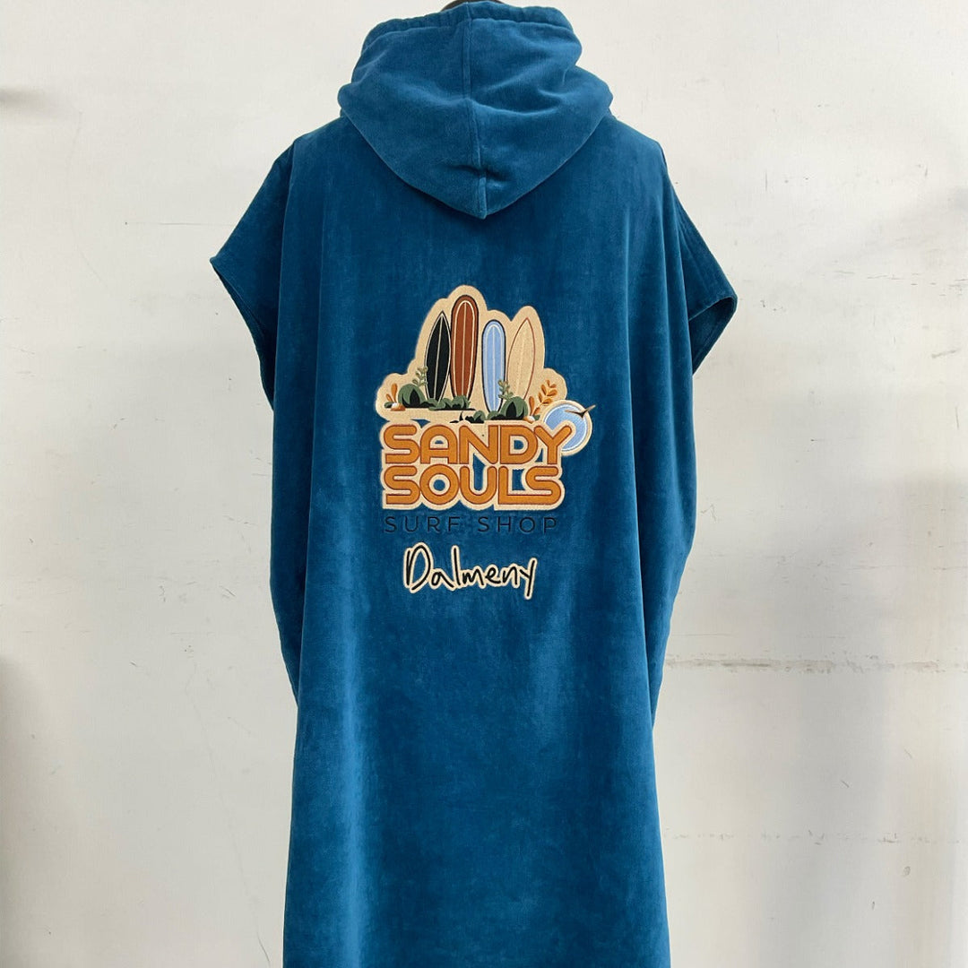 Blue sleeveless hooded towel with surfboard design 