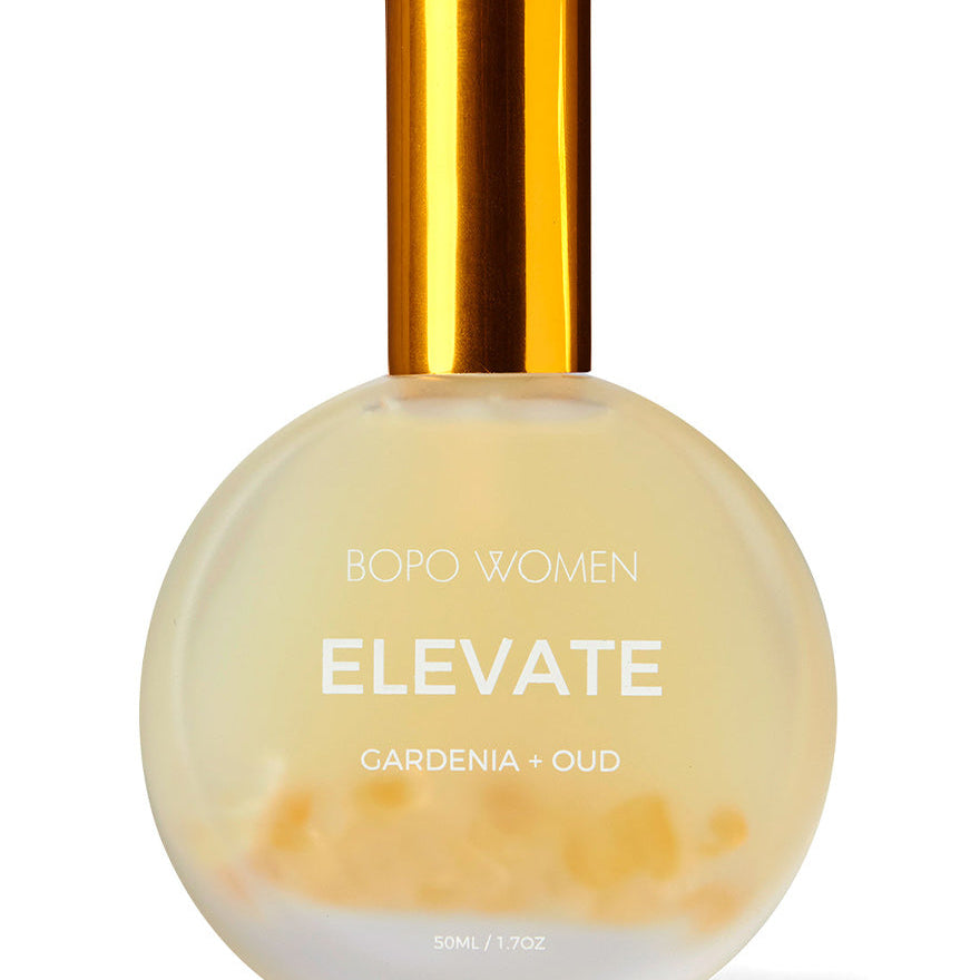 Perfume bottle labeled 'Elevate' by Bopo Women with a gold cap on a white background