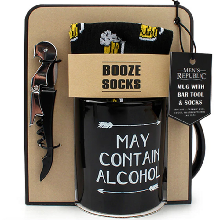 Mug with bar tool, socks, and bottle opener set in packaging with 'Men's Republic' tag.